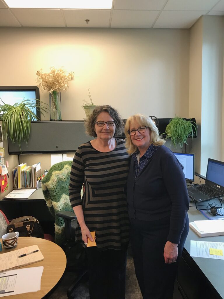 Washington State Auditor Pat McCarthy congratulates Assistant Audit Manager Alexandra Johnson on 28 years of service at the Office of the Washington State Auditor. Johnson is retiring Oct. 1.