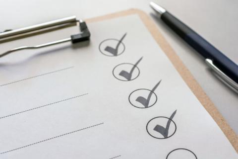 Photograph of a checklist on a clipboard.