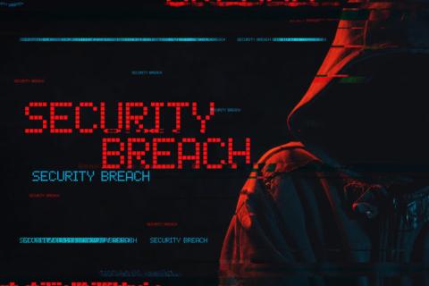 Hooded figure next to a screen that reads "Security breach"