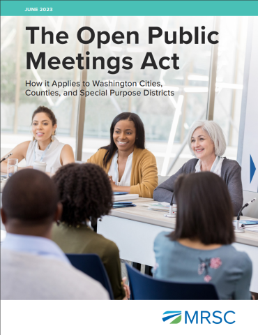 Cover of SAO and MRSC's guide titled "Open Public Meetings Act: How it applies to Washington cities, counties and special purpose districts. The cover features a photograph of five people around a table conducting a meeting. 