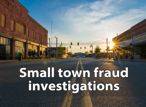 typical small-town street lined with buildings including text Small town fraud investigations